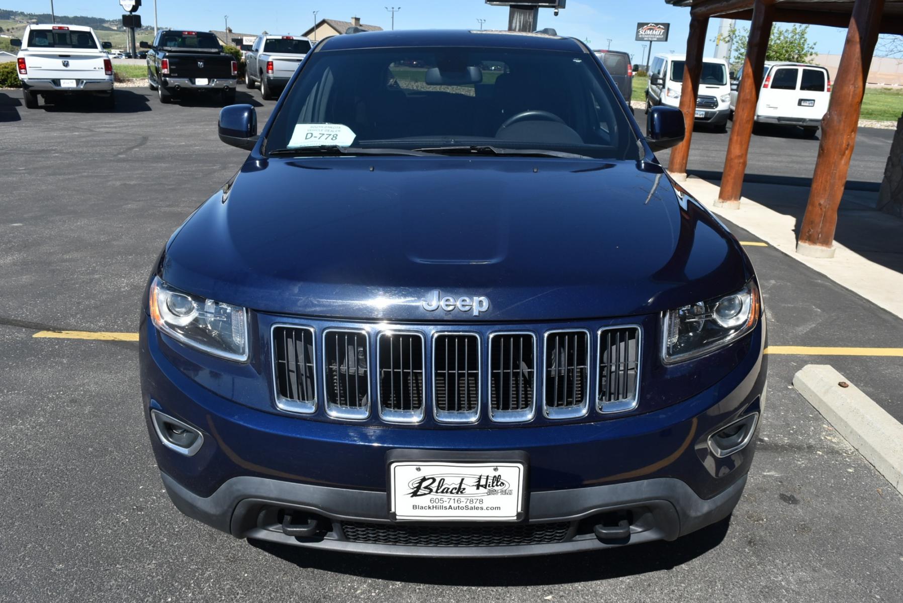 2014 Blue /Black Jeep Grand Cherokee Laredo (1C4RJFAG6EC) with an 3.6L V6 24 Valve VVT engine, 8-Speed Automatic transmission, located at 1600 E Hwy 44, Rapid City, SD, 57703, (605) 716-7878, 44.070232, -103.171410 - Photo #1